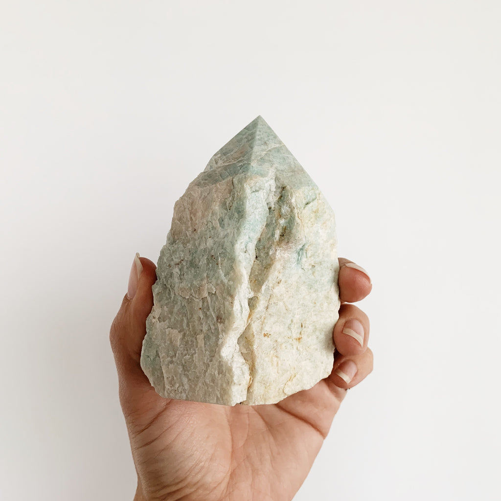 Rough light green-blue Amazonite tower with polished point