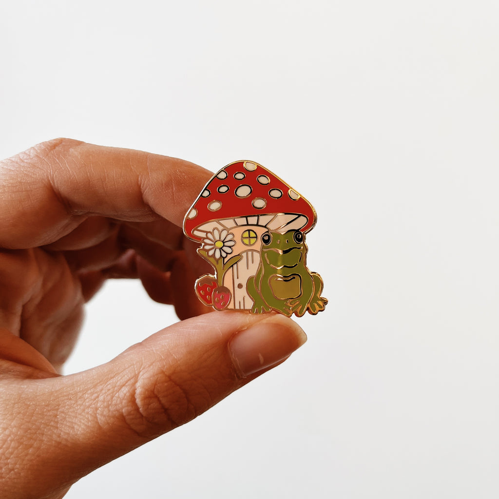 Frog and mushroom enamel pin